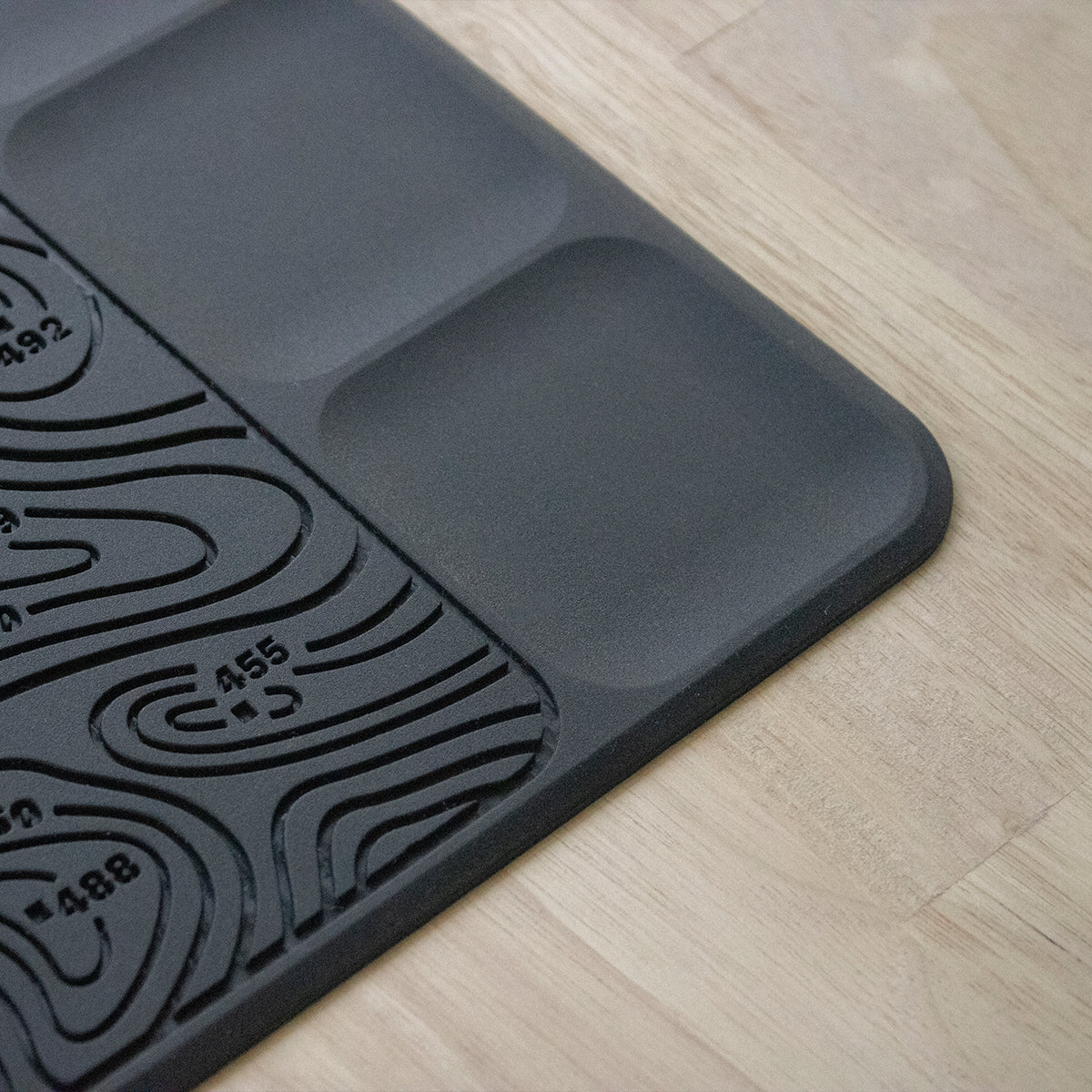 Closeup of one of three gear trays of the EDC mat